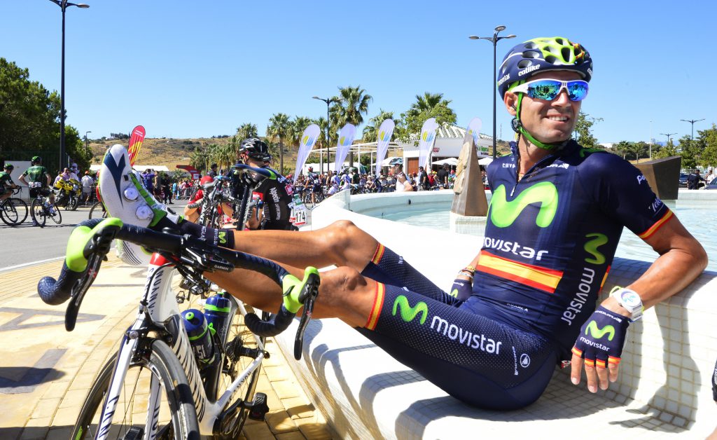 Movistar's Spanish cyclist Alejandro Valverde sits beside a fountain with his legs propped on his bike before the fourth stage of the 2015 Vuelta Espana cycling tour, a 213,6 Km stage between Estepona and Vejer de la Frontera on,August 25,2015. AFP PHOTO/JOSE JORDAN (Photo credit should read JOSE JORDAN/AFP/Getty Images)