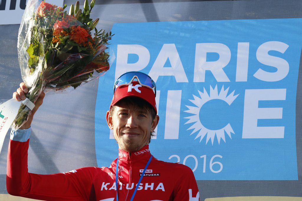 Russian Ilnur Zakarin celebrates on the podium after winning the 74th edition of the Paris-Nice cycling race between Nice and La Madone d'Utelle on March 12, 2016. / AFP / KENZO TRIBOUILLARD (Photo credit should read KENZO TRIBOUILLARD/AFP/Getty Images)
