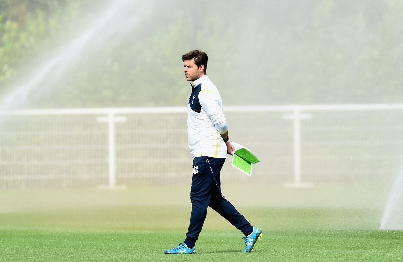ENFIELD, ENGLAND - AUGUST 27: Manager of Tottenham Hotspur, Mauricio Pochettino looks on during a Tottenham Hotspur training session on August 27, 2014 in Enfield, England. (Photo by Jamie McDonald/Getty Images)